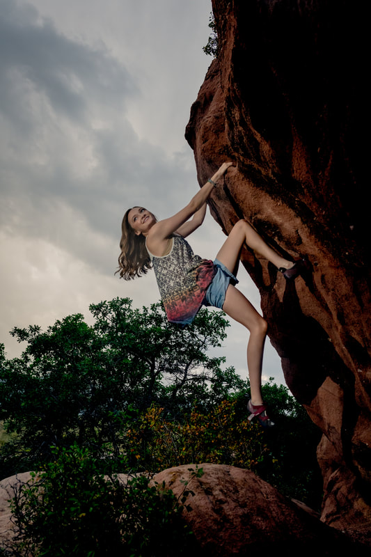 Girl rock climbing in golden colorado for an outdoor senior picture sarah lindsay photography